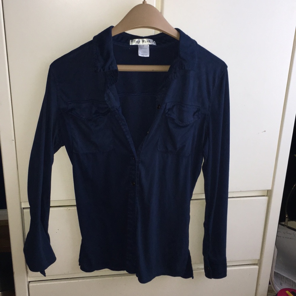 a soft, blue, button down top